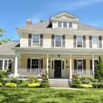 Beautiful New Rochelle home with green lawn.